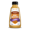 A 12 oz squeeze bottle of True Made Foods GF Keto Honey Mustard on a white background. The bottle contains golden mustard and features a black cap with a white, orange, and purple label.